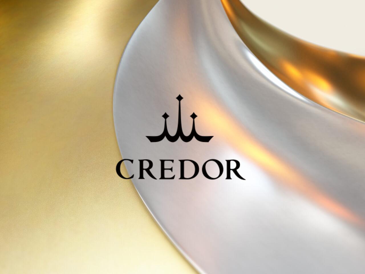 フランス語で「黄金の頂き」を意味するクレドールのロゴ クレストマーク