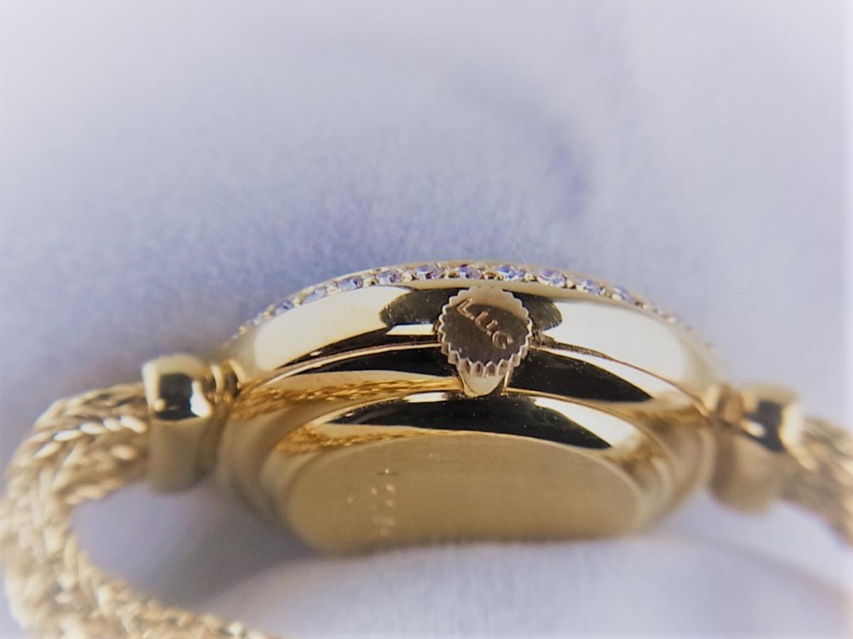 ショパール ハッピーダイヤモンド K18YG ムービングダイヤ3Ｐ　ダイヤモンドベゼル＋ラグ　レディース腕時計　買い取り実績　3時リューズサイド画像