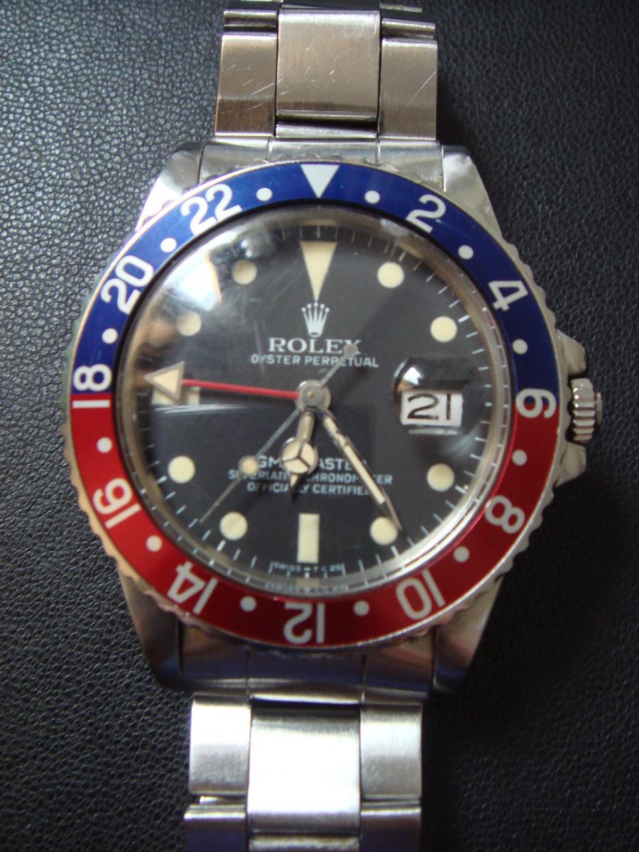 ロレックス GMTマスター1 1675 ブラックポイント文字盤、デイト表示、GMT針 青赤ベゼルペプシ 100m防水(中古)高価買取事例