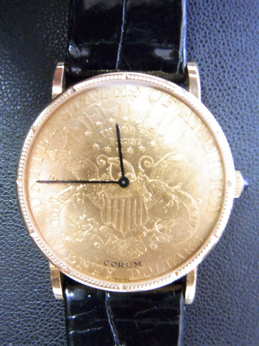 コルム コインウォッチ 手巻き アンティークコインウォッチ刻印入り 金装飾あり、手巻き式腕時計、(中古)高価買取事例